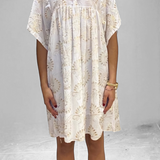 Tunique en dentelle blanche et dorée