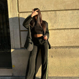 PANTALON NOIRE AVEC BANDE JAUNE